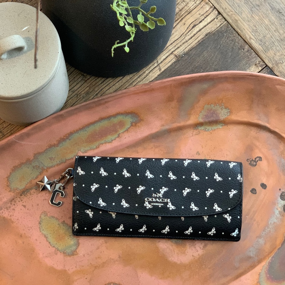 COACH BUTTERFLY WALLET WITH CHARMS
